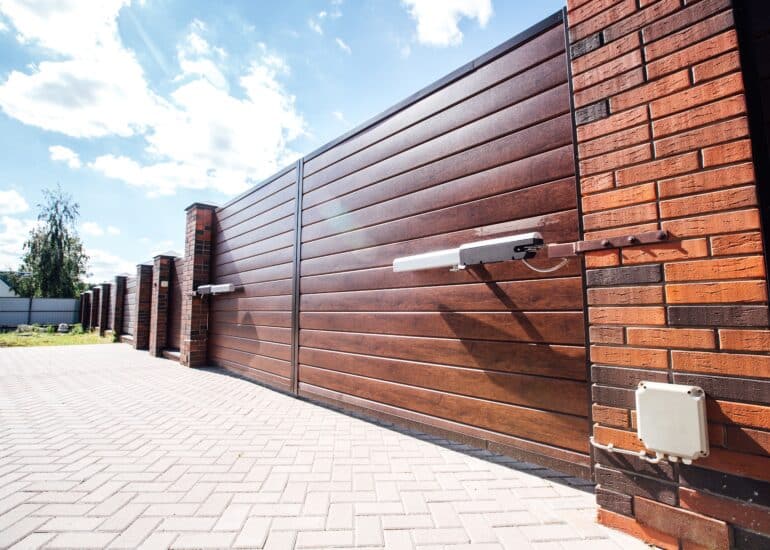 HySecurity SlideDriver installed on a commercial gate for enhanced security and smooth operation.